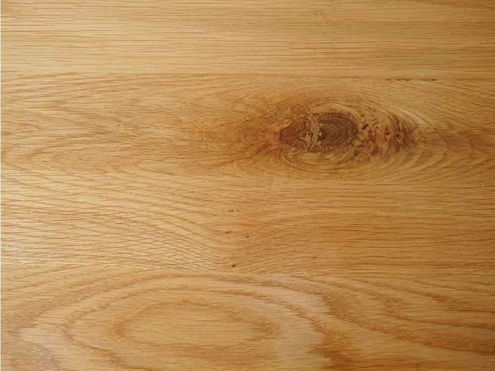 ブラウンの木製フローリングの画像