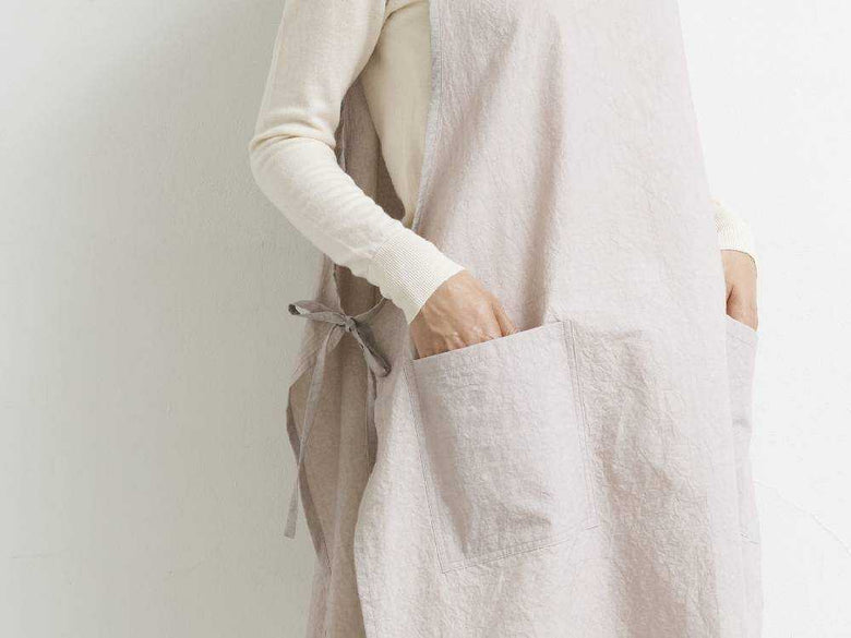 黒色のSUNNY LOCATIONビブエプロン