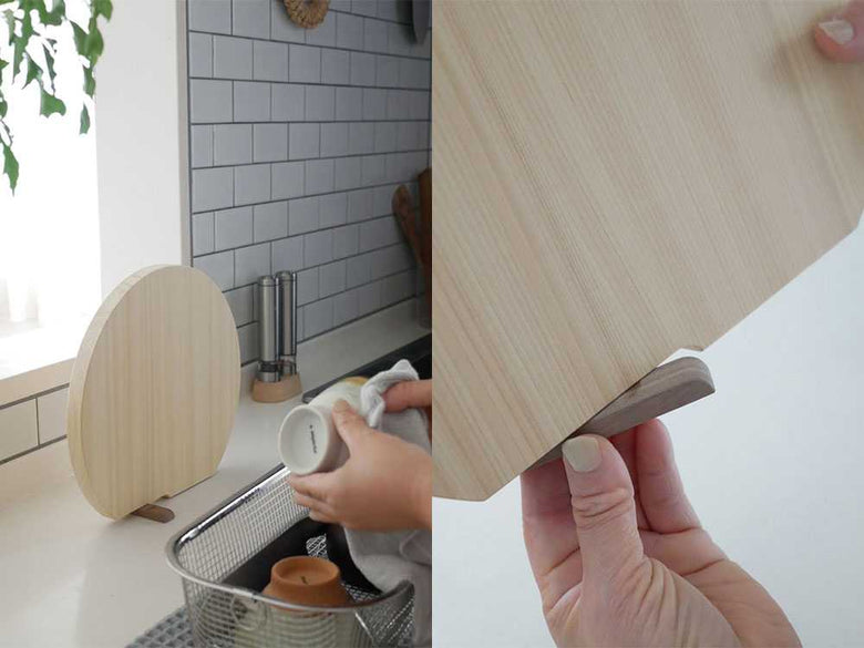 ヒノキの立つ丸いまな板がキッチンで使用中