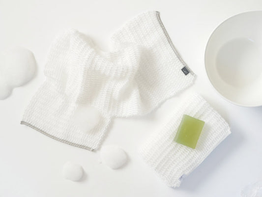 h tagボディウォッシュタオルの画像