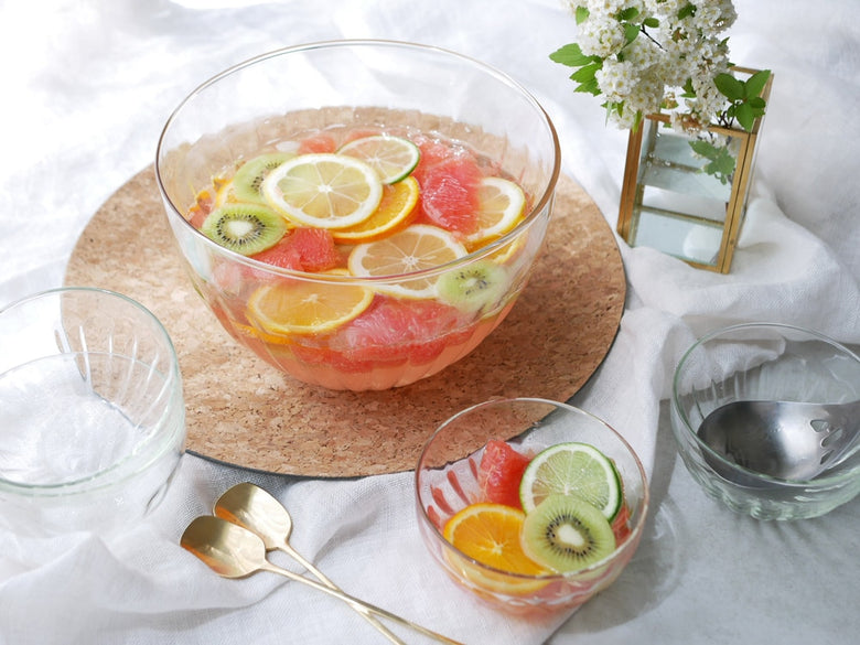 オレンジとグレープフルーツが入ったリューズガラスのラウンドボウル