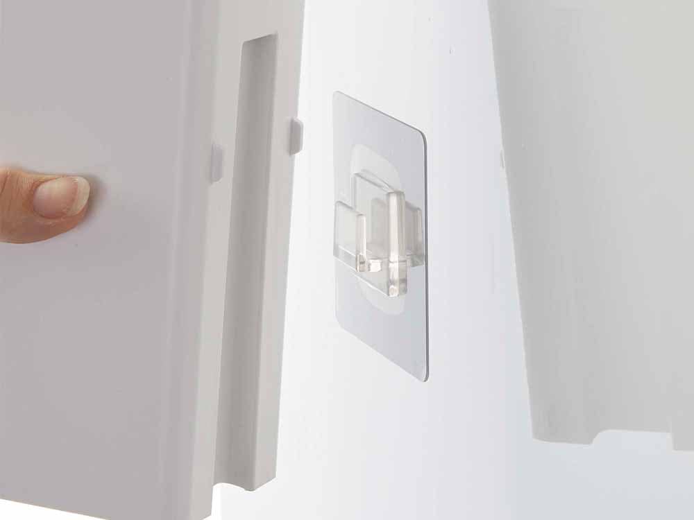 タワー製フィルムフックツーウェイディスペンサーが壁に設置された画像