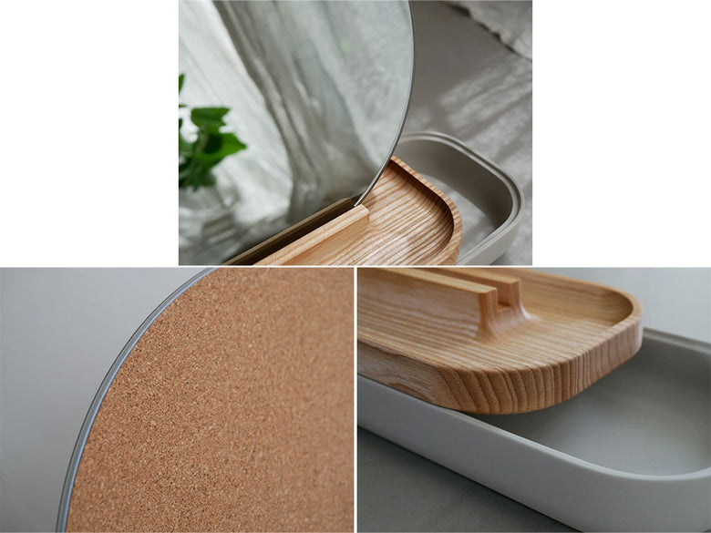 フリッツ・ハンセン SLIDE、コンクリートとアッシュ材を使用したミラートレイとカッティングボードが配置された木製キッチン用品