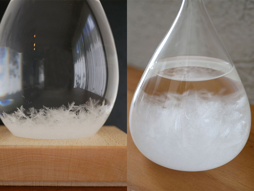 100percent ヒャクパーセントのTempo Dropに透明な液体と銀色の球体が入ったガラス製の静物写真