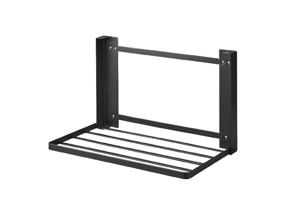 スチール製の折りたたみ可能な【tower/タワー】棚が石こうボード壁に取り付けられている様子。幅約41cm、奥行26cm、高さ25.5cmで、シリコーンクッション付きの棚が見える。