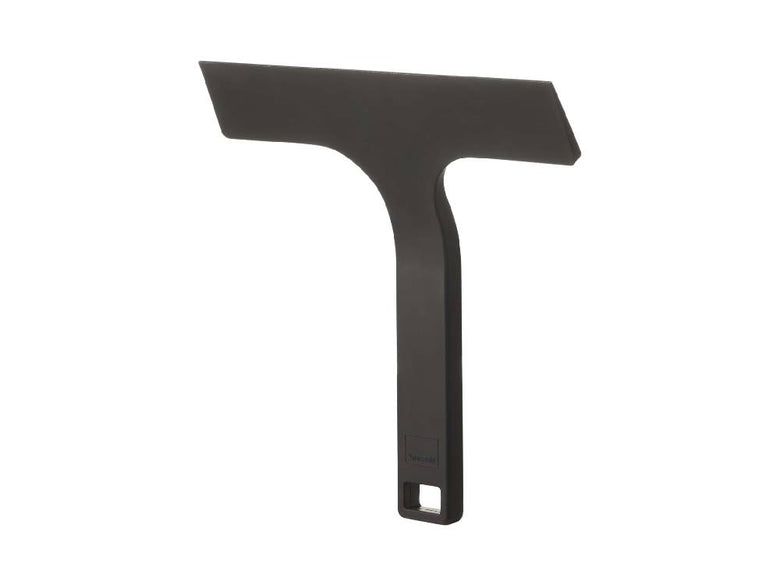 シリコーンとマグネット製の【tower/タワー】マグネット水切りワイパー Sがスチールの壁面に取り付けられている様子