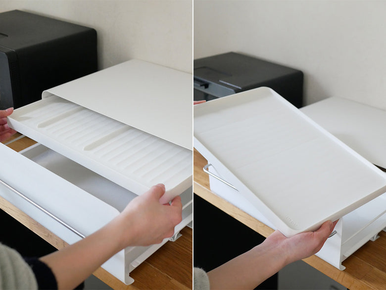 UtaUカウンタードロワーの木製キャビネットで、木目の棚と引き出しが備わった家具の画像