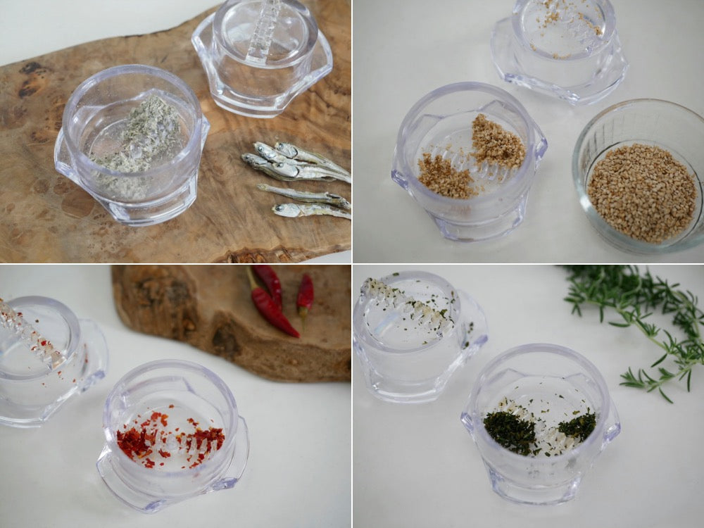 トライタン製の【アークトレーディング】ガーリックツイストが、食材や調味料と共にテーブルウェア上に美しく並べられている様子