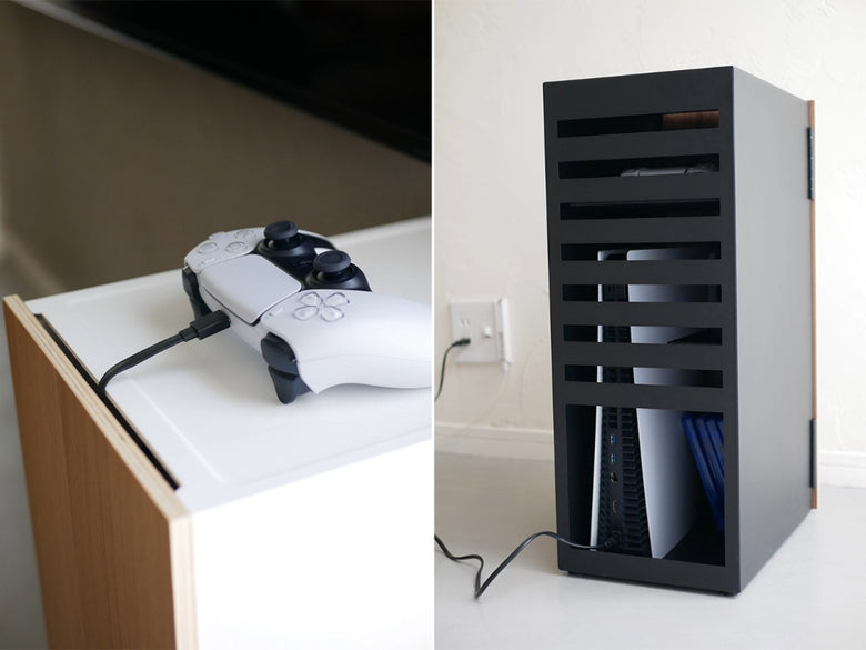 スチール製のタワー型ゲーム機収納ラックが部屋に設置されている様子