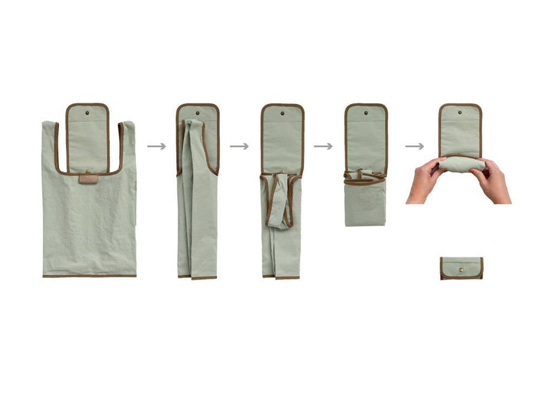 【RELIEF】エコバッグ。ナイロン100％製で開閉ボタンと内ポケットが付いた折りたたみ式バッグ。広げた状態での写真。