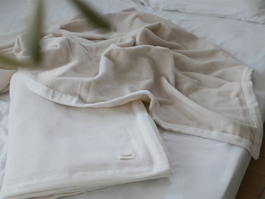 cocomaniのオーガニックコットン100％シングルサイズ毛布、アイボリー色の柔らかい寝具