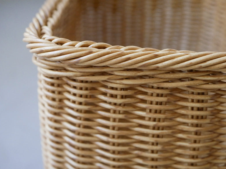 クレエの洗えるナイールストレージバスケット。自然素材の籐製で持ち手が付いた家庭用収納バスケット。
